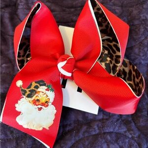 Beautiful Holiday hair bow. Definitely an eye catcher.